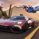 A screenshot from Forza Horizon 5 showing the AMG-Mercedes Project One racing a cargo plane.
